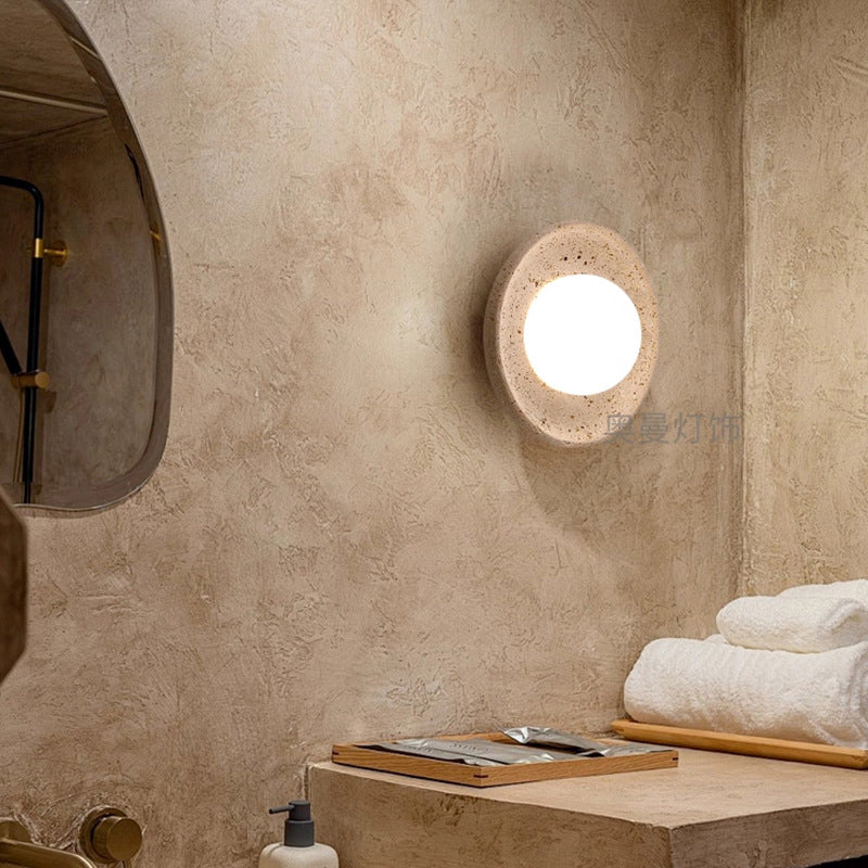Yellow travertine wall lamps are used in bedrooms, living rooms, and clothing stores.
