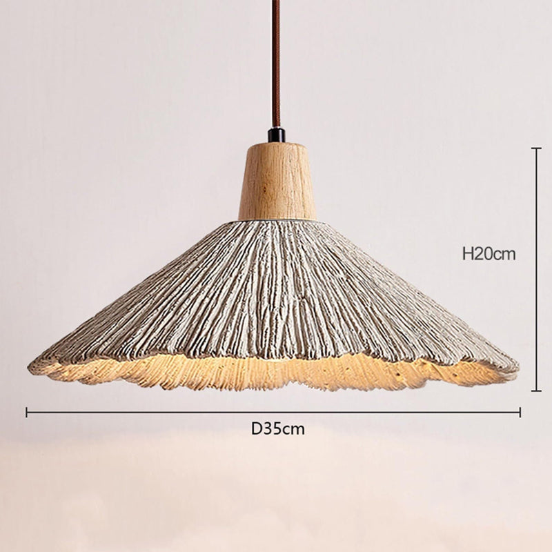 Umbrella-shaped cement penndant lamps are used in restaurant kitchens, etc.