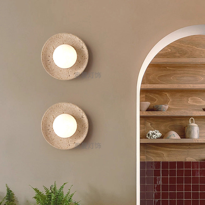 Yellow travertine wall lamps are used in bedrooms, living rooms, and clothing stores.