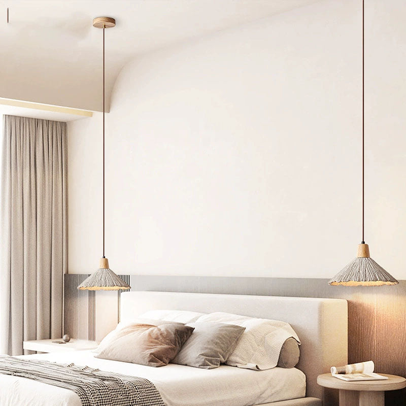 Umbrella-shaped cement penndant lamps are used in restaurant kitchens, etc.