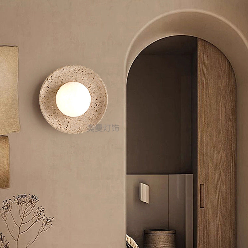 Yellow travertine wall lamps are used in bedrooms, living rooms, and clothing stores.